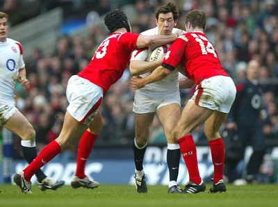 04.02.06.. England v Wales, RBS Six Nations, Twickenham Englands Tom Voyce is caught by Hal Luscombe and Mark Jones 