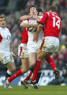 04.02.06.. England v Wales, RBS Six Nations, Twickenham Englands Tom Voyce is caught by Hal Luscombe and Mark Jones 