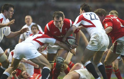 04.02.06.. England v Wales, RBS Six Nations, Twickenham Wales' Robert Sidoli is tackled by Ben Cohen and Tom Voyce 