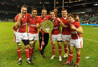 250212 - England v Wales - RBS Six Nations 2012 -Ryan Jones, Toby Faletau, Jamie Roberts, Sam Warburton, Dan Lydiate and Leigh Halfpenny of Wales celebrate winning the tripple crown