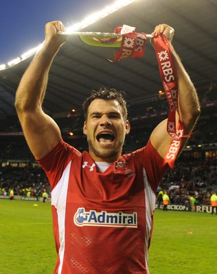 250212 - England v Wales - RBS Six Nations 2012 -Mike Phillips of Wales celebrates winning the tripple crown