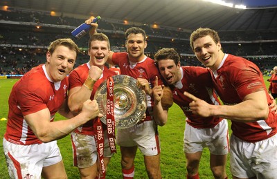 250212 - England v Wales - RBS Six Nations 2012 -Jonathan Davies, Scott Williams, Mike Phillips, Alex Cuthbert and Scott Williams of Wales celebrate winning the tripple crown