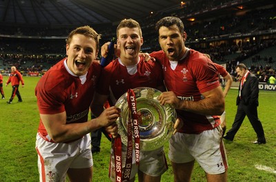 250212 - England v Wales - RBS Six Nations 2012 -Jonathan Davies, Scott Williams and Mike Phillips of Wales celebrate winning the tripple crown