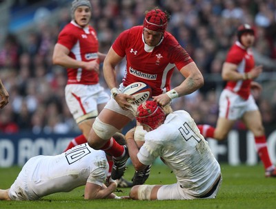 250212 - England v Wales, RBS 6 Nations - Wales' Alun Wyn Jones  is stopped by England's Owen Farrell and  Mouritz Botha 