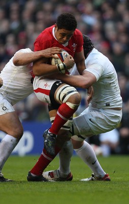 250212 - England v Wales, RBS 6 Nations - Wales' Toby Faletau is stopped by the English defence