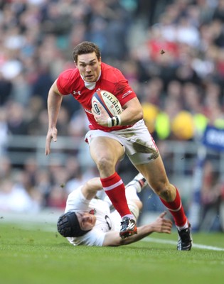 250212 England v WalesWales' George North slips tackle by England's Ben Morgan