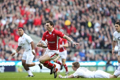 250212 England v WalesWales' George North slips tackle by England's David Strettle