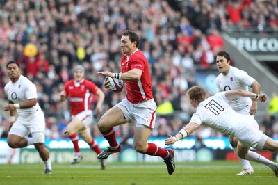 250212 England v WalesWales' George North slips tackle by England's David Strettle