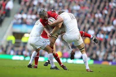 250212 England v WalesWales' Jonathan Davies is tackled by England's Tom Croft and England's Lee Dickson