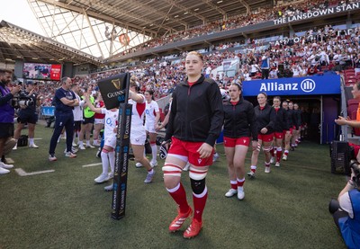 250426 - England v Wales, 2026 Guinness Women’s 6 Nations - Bethan Lewis of Wales leads the team out at the start of the match
