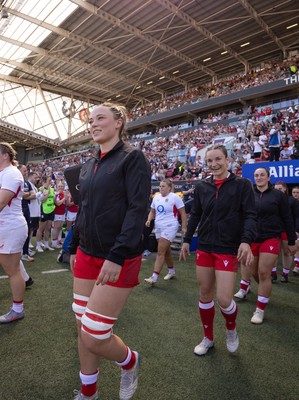 250426 - England v Wales, 2026 Guinness Women’s 6 Nations - Alisha Joyce of Wales and Jasmine Joyce of Wales walk out onto the pitch for the start of the match