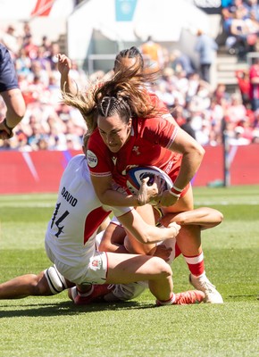 250426 - England v Wales, 2026 Guinness Women’s 6 Nations - Courtney Keight of Wales is tackled just short of the line