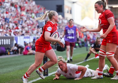 250426 - England v Wales, 2026 Guinness Women’s 6 Nations - Seren Lockwood of Wales celebrates with Alisha Joyce of Wales after she dives in to score try