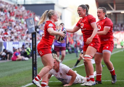 250426 - England v Wales, 2026 Guinness Women’s 6 Nations - Seren Lockwood of Wales celebrates with Alisha Joyce of Wales after she dives in to score try