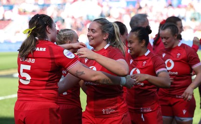 250426 - England v Wales, 2026 Guinness Women’s 6 Nations - Freya Bell of Wales is embraced at the end of the match