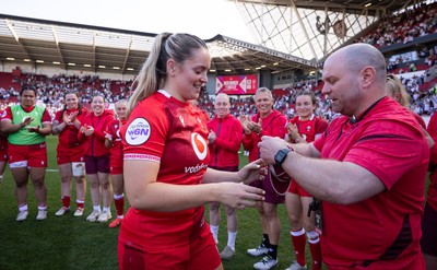250426 - England v Wales, 2026 Guinness Women’s 6 Nations - Freya Bell of Wales receives her first cap from Sean Lynn, Wales Women head coach
