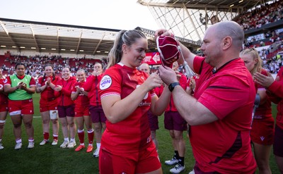 250426 - England v Wales, 2026 Guinness Women’s 6 Nations - Freya Bell of Wales receives her first cap from Sean Lynn, Wales Women head coach