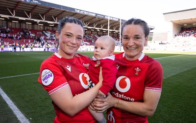 250426 - England v Wales, 2026 Guinness Women’s 6 Nations - Alisha Joyce of Wales and Jasmine Joyce of Wales with Ralphie at the end of the match