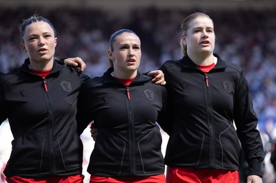 250426 - England v Wales, 2026 Guinness Women’s 6 Nations - Left to right, Alisha Joyce of Wales, Kayleigh Powell of Wales and Bethan Lewis of Wales line up for the anthems ahead of the match