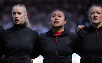 250426 - England v Wales, 2026 Guinness Women’s 6 Nations - Catherine Richards of Wales, Jenna De Vera of Wales and Lleucu George of Wales line up for the anthems ahead of the match