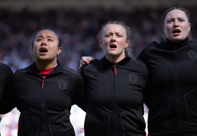 250426 - England v Wales, 2026 Guinness Women’s 6 Nations - Jenna De Vera of Wales, Lleucu George of Wales and Gwen Crabb of Wales line up for the anthems ahead of the match