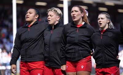 250426 - England v Wales, 2026 Guinness Women’s 6 Nations - Sisilia Tuipulotu of Wales, Donna Rose of Wales, Georgia Evans of Wales and Keira Bevan of Wales line up for the anthems ahead of the match