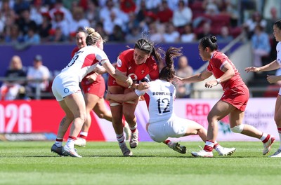 250426 - England v Wales, 2026 Guinness Women’s 6 Nations - Jorja Aiono of Wales takes on Helena Rowland of England 