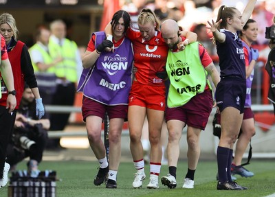 250426 - England v Wales, 2026 Guinness Women’s 6 Nations - Catherine Richards of Wales leaves the pitch after receiving treatment for an injury