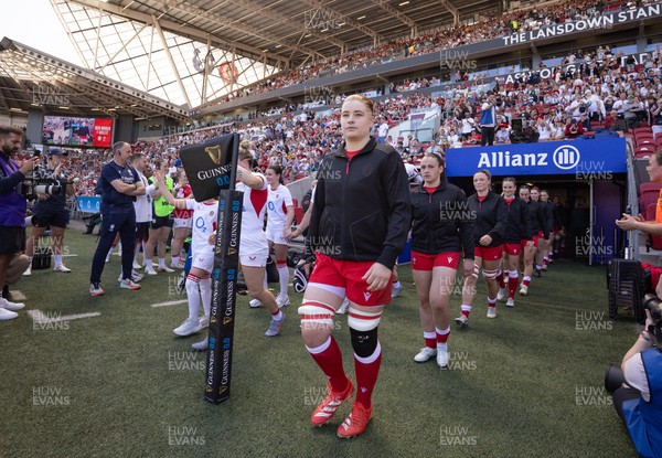 250426 - England v Wales, 2026 Guinness Women’s 6 Nations - Bethan Lewis of Wales leads the team out at the start of the match