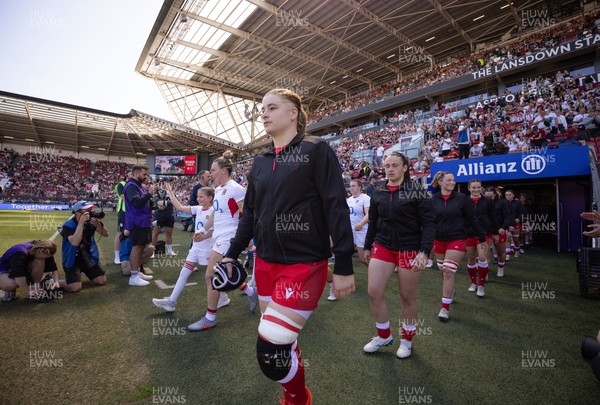 250426 - England v Wales, 2026 Guinness Women’s 6 Nations - Bethan Lewis of Wales leads the team out at the start of the match