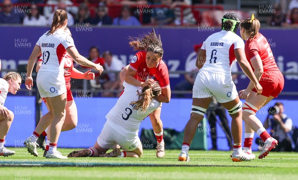 250426 - England v Wales, 2026 Guinness Women’s 6 Nations - Jorja Aiono of Wales takes on Sarah Bern of England