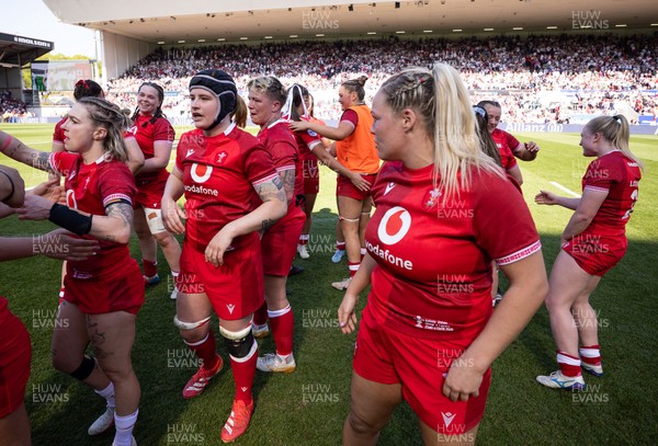 250426 - England v Wales, 2026 Guinness Women’s 6 Nations - Wales players embrace each other at the end of the match