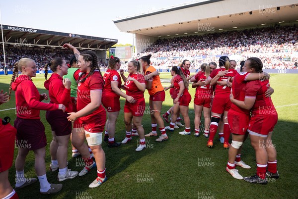 250426 - England v Wales, 2026 Guinness Women’s 6 Nations - Wales players embrace each other at the end of the match
