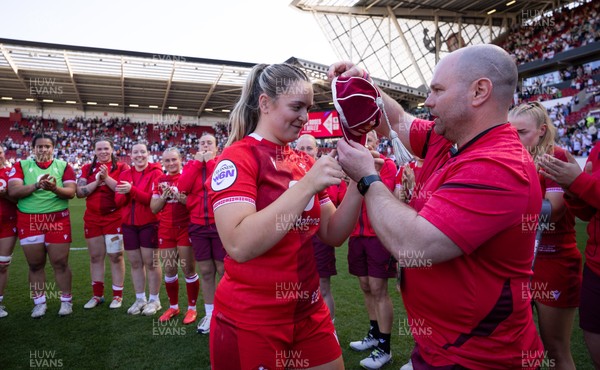 250426 - England v Wales, 2026 Guinness Women’s 6 Nations - Freya Bell of Wales receives her first cap from Sean Lynn, Wales Women head coach