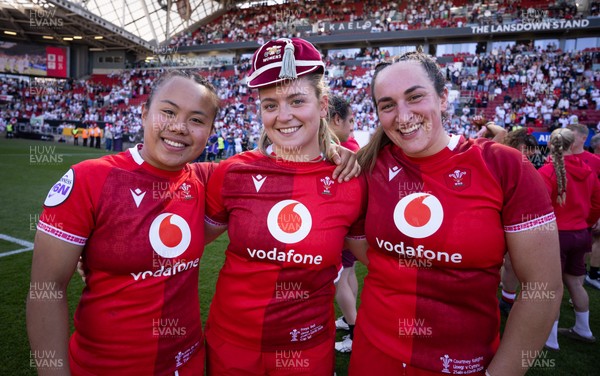 250426 - England v Wales, 2026 Guinness Women’s 6 Nations - Jenna De Vera of Wales and Courtney Keight of Wales with Freya Bell of Wales at the end of the match