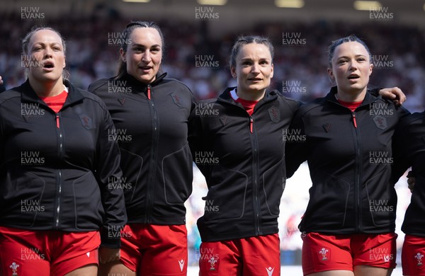 250426 - England v Wales, 2026 Guinness Women’s 6 Nations - Left to right, Kelsey Jones of Wales, Courtney Keight of Wales, Jasmine Joyce of Wales and Alisha Joyce of Wales line up for the anthems ahead of the match