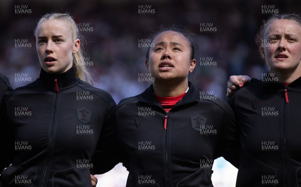 250426 - England v Wales, 2026 Guinness Women’s 6 Nations - Catherine Richards of Wales, Jenna De Vera of Wales and Lleucu George of Wales line up for the anthems ahead of the match