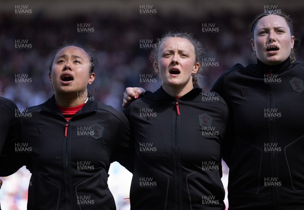 250426 - England v Wales, 2026 Guinness Women’s 6 Nations - Jenna De Vera of Wales, Lleucu George of Wales and Gwen Crabb of Wales line up for the anthems ahead of the match