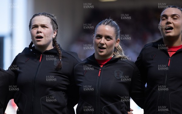 250426 - England v Wales, 2026 Guinness Women’s 6 Nations - Maisie Davies of Wales, Freya Bell of Wales and Bryonie King of Wales line up for the anthems ahead of the match