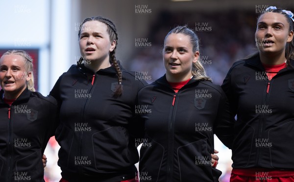 250426 - England v Wales, 2026 Guinness Women’s 6 Nations - Seren Singleton of Wales, Maisie Davies of Wales, Freya Bell of Wales and Bryonie King of Wales line up for the anthems ahead of the match
