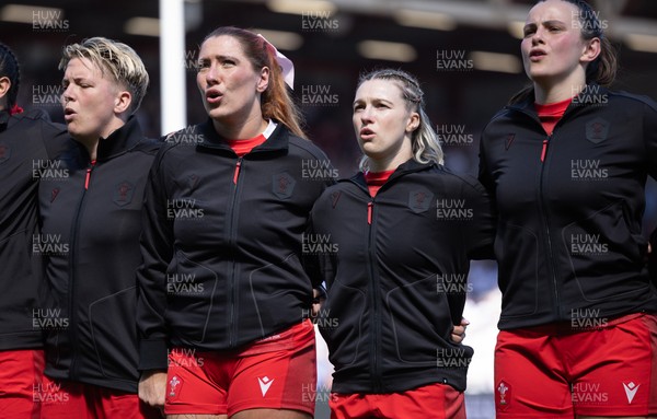 250426 - England v Wales, 2026 Guinness Women’s 6 Nations - Donna Rose of Wales, Georgia Evans of Wales, Keira Bevan of Wales and Branwen Metcalfe of Wales line up for the anthems ahead of the match