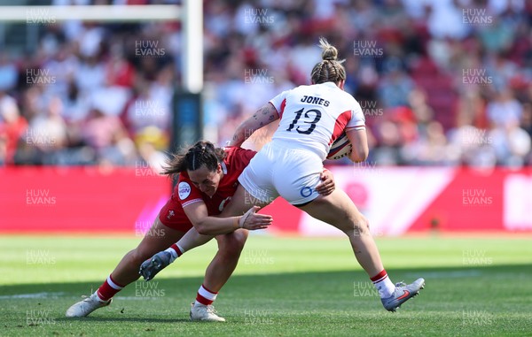 250426 - England v Wales, 2026 Guinness Women’s 6 Nations - Courtney Keight of Wales tackles Megan Jones of England 