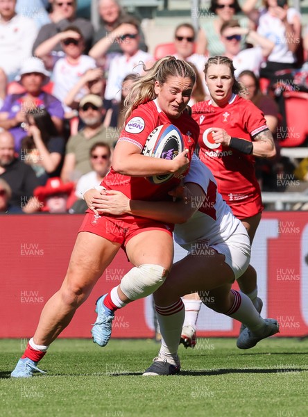 250426 - England v Wales, 2026 Guinness Women’s 6 Nations - Freya Bell of Wales charges forward on her debut