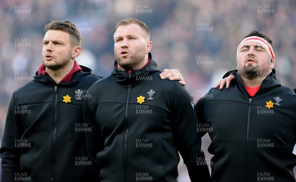 260222 - England v Wales - Guinness Six Nations 2022 - Dan Biggar, Ross Moriarty, Wyn Jones of Wales during the anthems