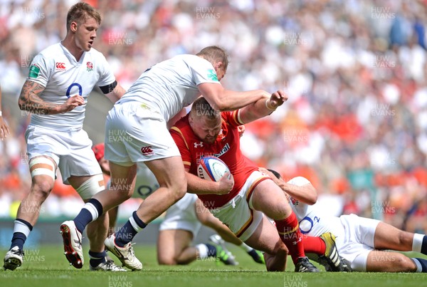 290516 - England v Wales - Old Mutual Wealth Cup -Samson Lee of Wales is tackled by Dylan Hartley of England