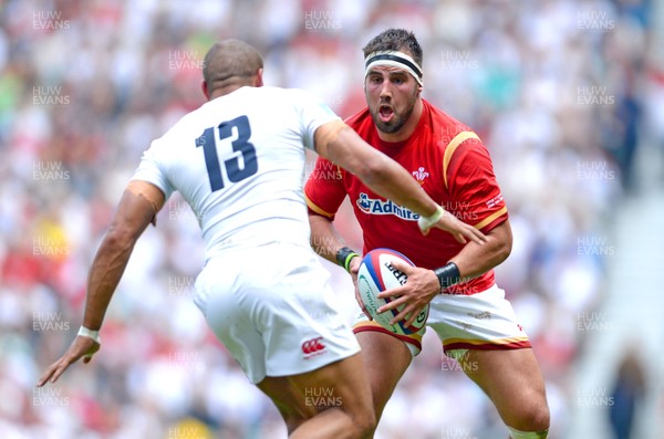 290516 - England v Wales - Old Mutual Wealth Cup -Scott Baldwin of Wales takes on Jonathan Joseph of England