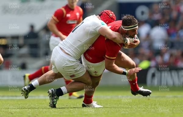 290516 - England v Wales - Old Mutual Wealth Cup - Scott Baldwin of Wales is tackled by James Haskell of England