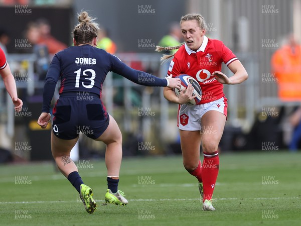300324 - England v Wales, Guinness Women’s 6 Nations - Hannah Jones of Wales takes on Megan Jones of England