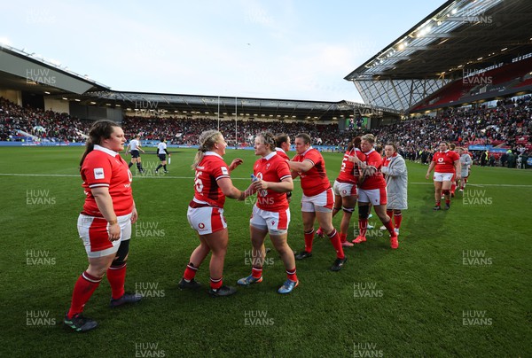 300324 - England v Wales, Guinness Women’s 6 Nations - Wales players hug each other at the end of the match