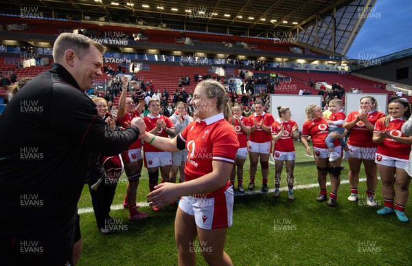300324 - England v Wales, Guinness Women’s 6 Nations - Ioan Cunningham, Wales Women head coach presents her first cap to Molly Reardon at the end of the match
